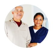 an old man and a woman standing