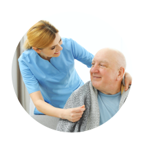 a woman taking care of an elderly man