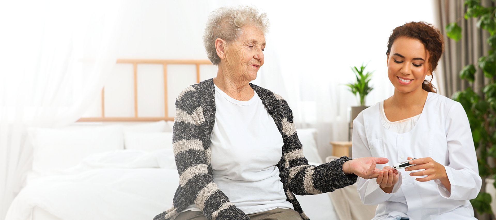 portrait of a nurse and an elder woman