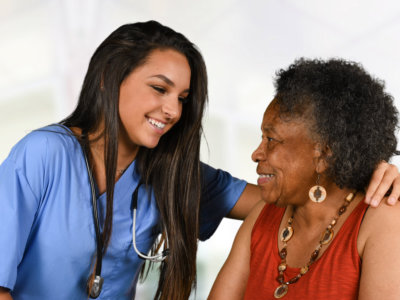 caregiver with elder woman